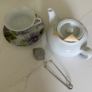 Teapot small white porcelain teapot and purple Rose teacup with strainer